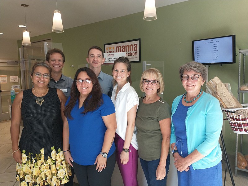 Staff from ACLAMO and Manna on Main Street in North Penn Commons. 