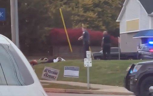 A screenshot from video of the arrest. 