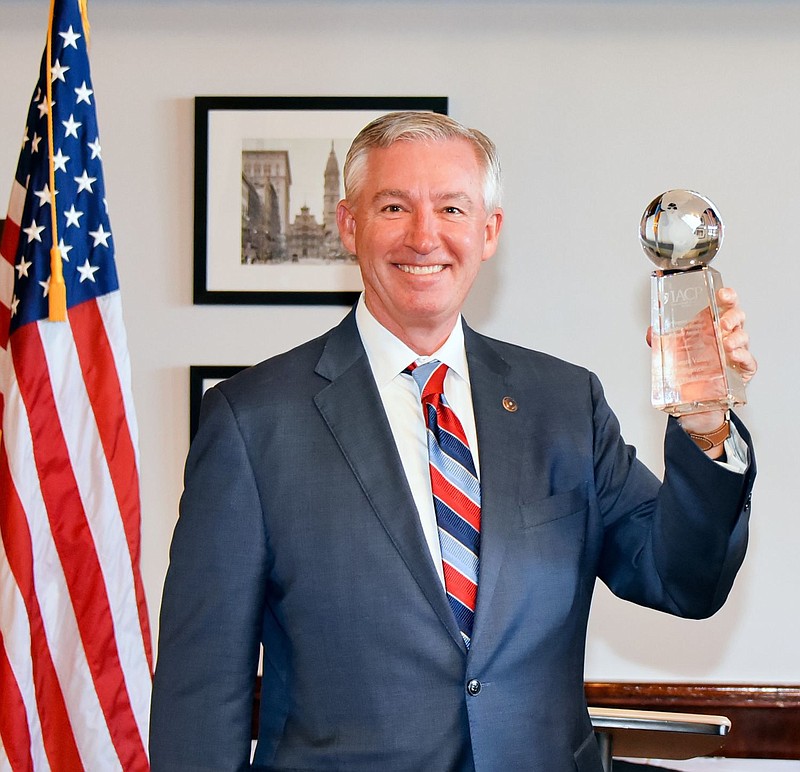 Montgomery County District Attorney Kevin Steele with the Vollmer Award. 