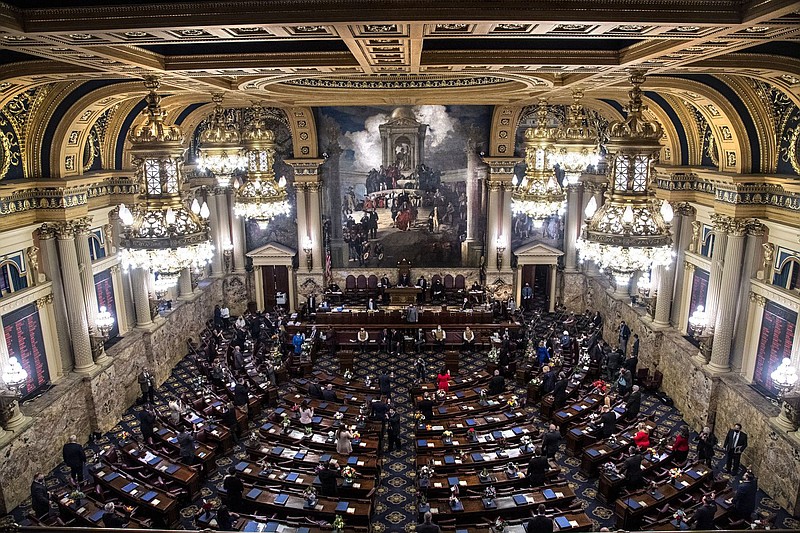 Pennsylvania lawmakers take the oath of office in the House chamber in the Capitol building in Harrisburg, PA in 2021. They will do so again this week