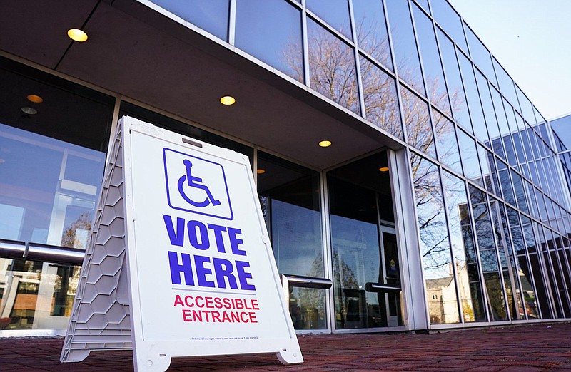 A voting sign sits outside the Allentown Public Library in Pennsylvania on Nov. 8, 2022. 