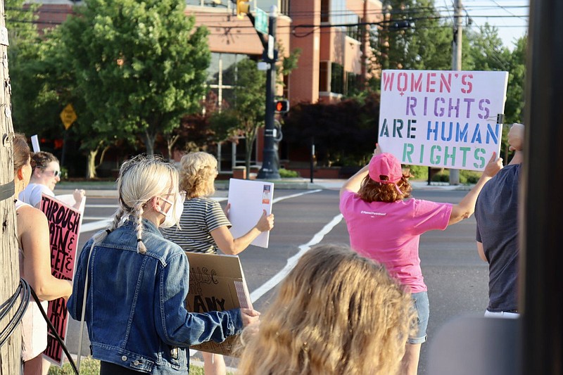 Pro-choice protestors gather at the intersection of Sumneytown Pike and Forty Foot Road in Towamencin on July 1. 