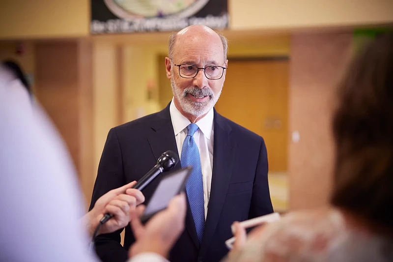 Gov. Tom Wolf speaking with reporters. 