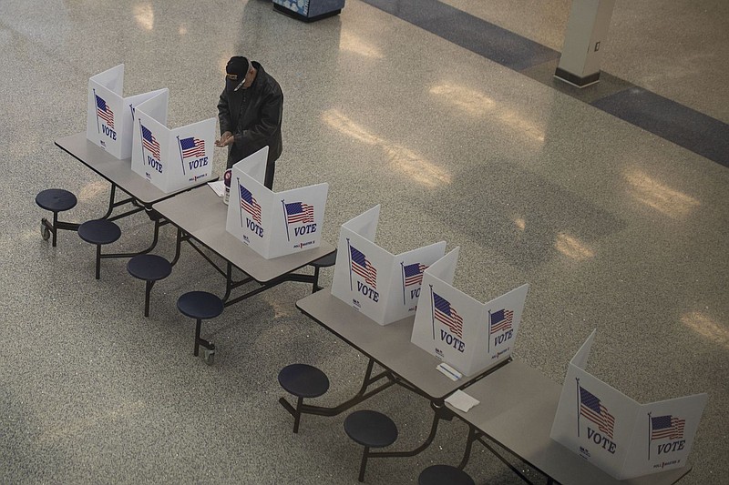 A man votes in a 2020 special election for Pa. House in Bucks County. This week, there will be three special elections for state House seats, this tim