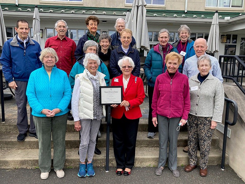 Susanne Johnston, of Towamencin Chapter Daughters of the American Revolution, presents their Community Service Award to Foulkeways at Gwynedd resident