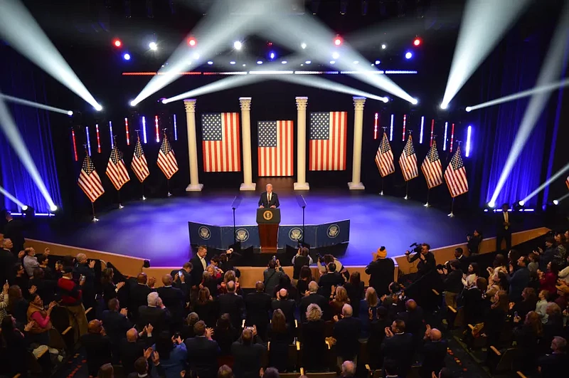 Attendees give a standing ovation to President Joe Biden Friday, Jan. 5, 2024, during a stop in Montgomery County Community College in Blue Bell. 