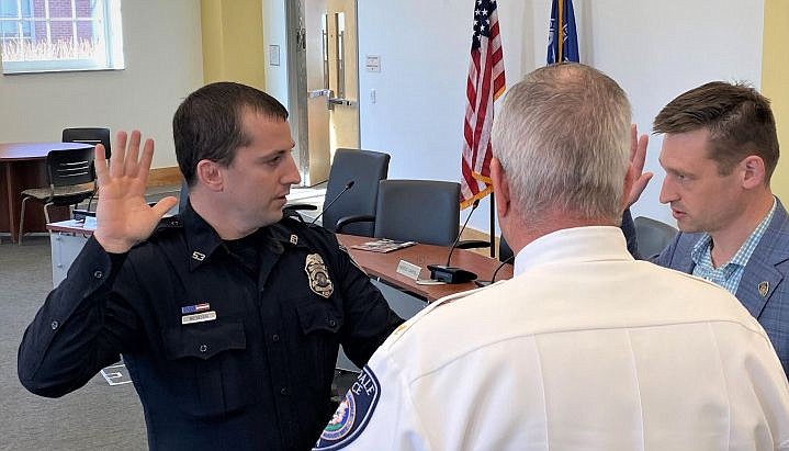 Sgt. James McVeigh is sworn-in by Lansdale Borough Mayor Garry Herbert. 