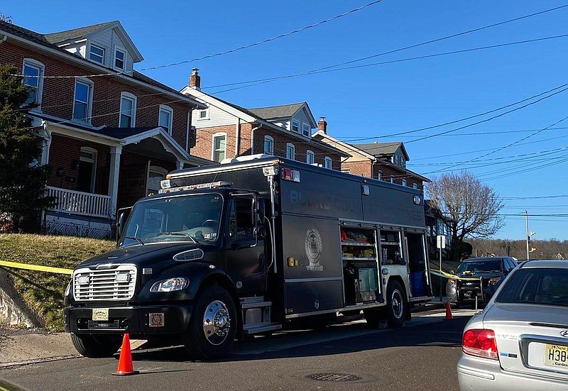 Police vehicles outside of the home of Elizabeth and Stephen Capaldi in Sellersville Friday, Dec. 9. 