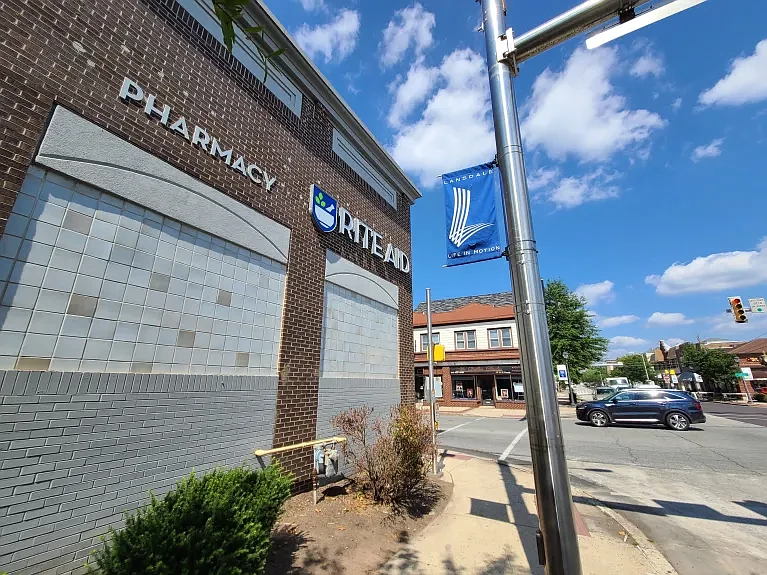 A “Lansdale: Life in Motion” banner hangs next to the Rite Aid store at Main and Broad Streets in Lansdale on Wednesday, Sept. 6 2023. 