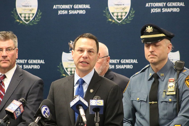 Attorney General Josh Shapiro addressing reporters in 2018. 