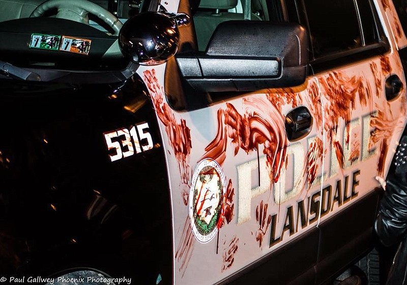 A Lansdale Police vehicle covered in fake blood. 