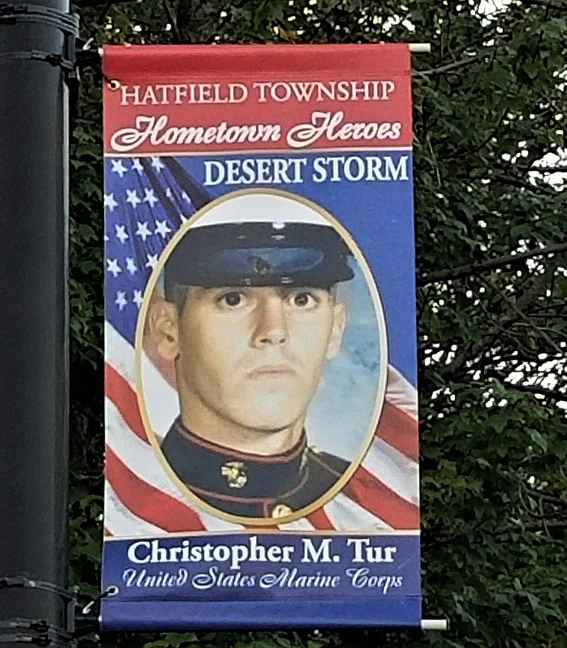 A Hometown Hero banner of Christopher Tur. 