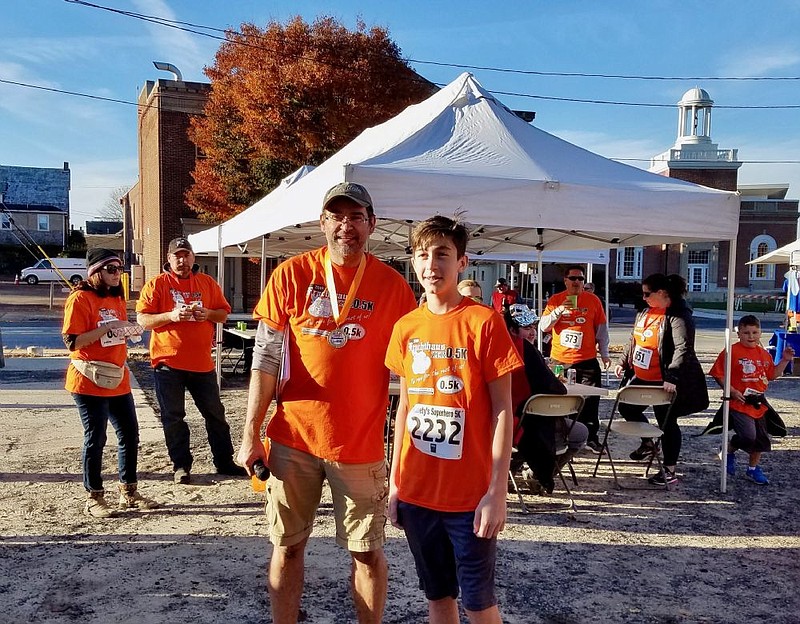 Race organizer Bill Henning with winner Ryan Van Dame. 