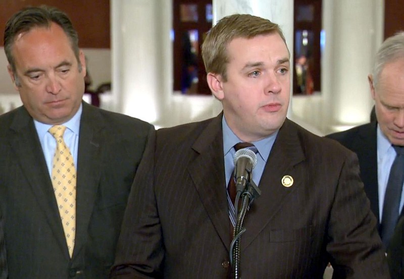 Pennsylvania House Majority Leader Bryan Cutler, flanked by Senate Majority Leader Jake Corman (left) and House Speaker Mike Turzai, speaks Feb. 5, 20