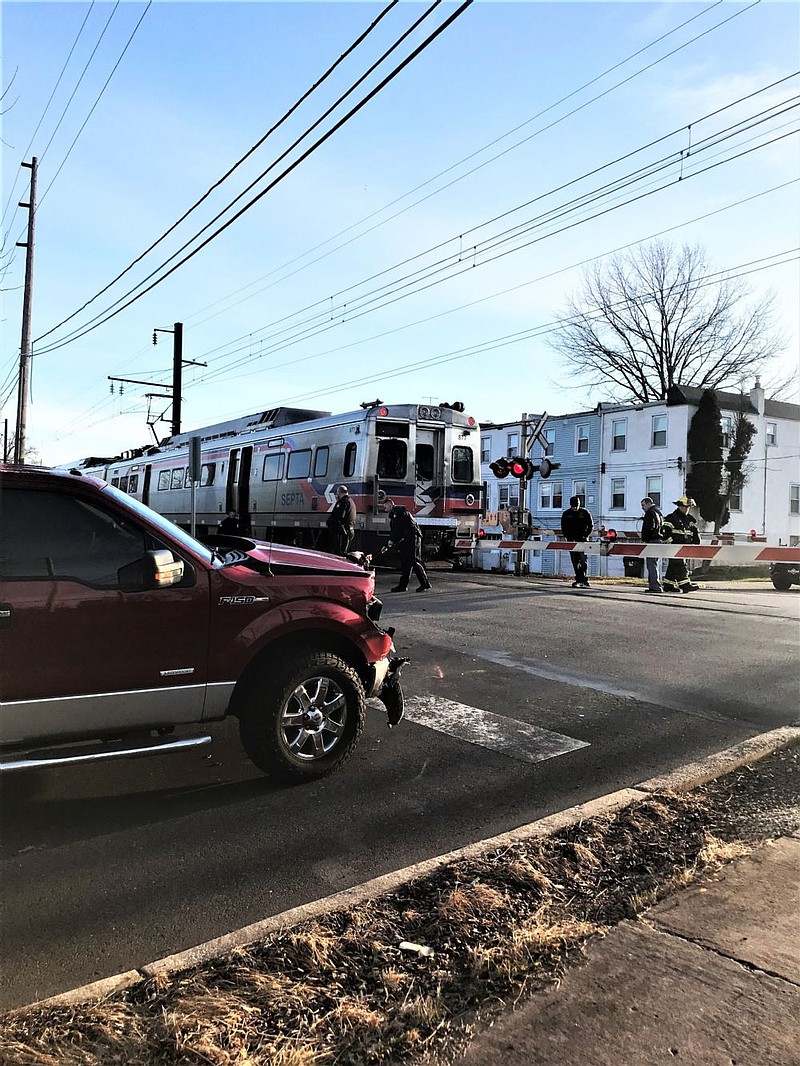 Damage to the truck can be seen on the front end. 