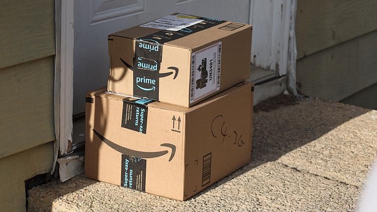 Amazon packages sitting on a suburban doorstep in York, Penn. 