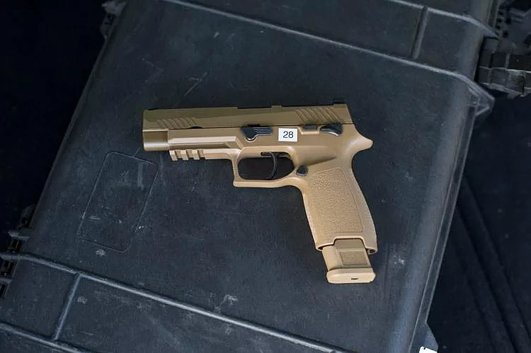 A Sig M17 pistol at the firing range on Camp Swift. The Sig M17 is replacing the older Beretta M9 pistol. 