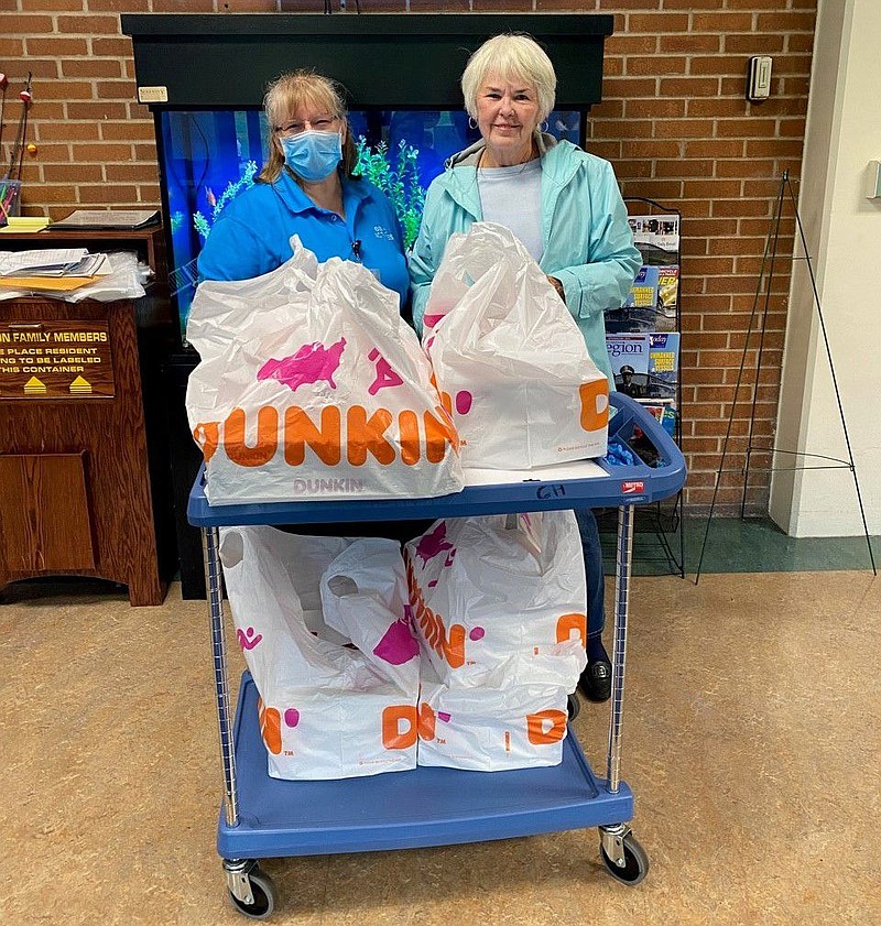 Jackie Williams, left, of the SEVC Activities Department, and Towamencin DAR member Joan LaMonica. 