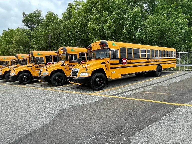 Propane-fueled North Penn School District buses are seen at the district transportation center after delivery in May 2023. 