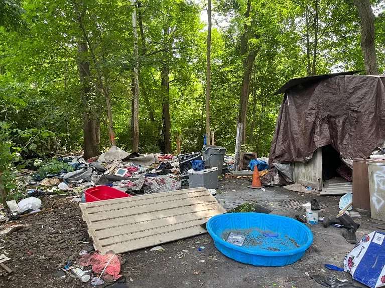 A homeless encampment is pictured June 9, 2023, just off the Schuylkill River Trail in Norristown. 