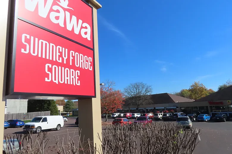 Cars sit parked in the parking lot of the Wawa convenience store in the “Sumney Forge Station” shopping center in Upper Gwynedd in November 2022. 