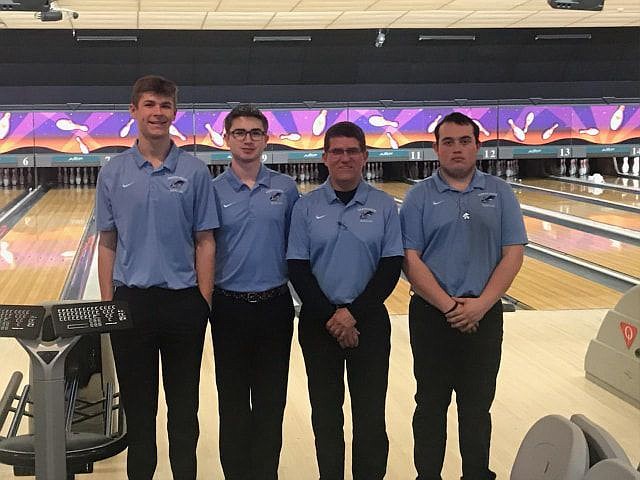 From left to right: Lucas Francis, James Carnal, Coach Donald Stadnycki and Martin Grace. 