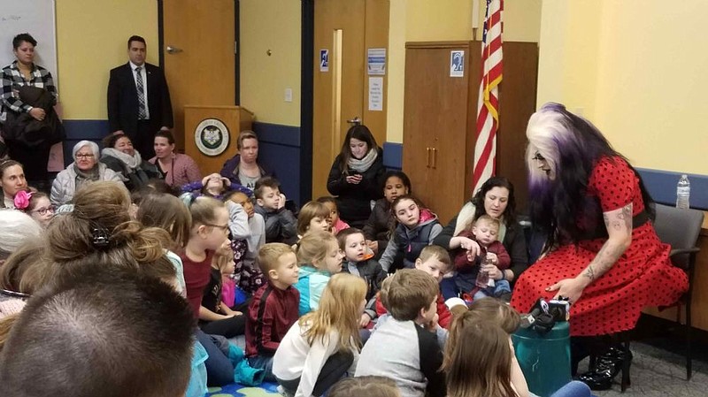 Miss Annie reads to children on Feb. 2, 2019. 