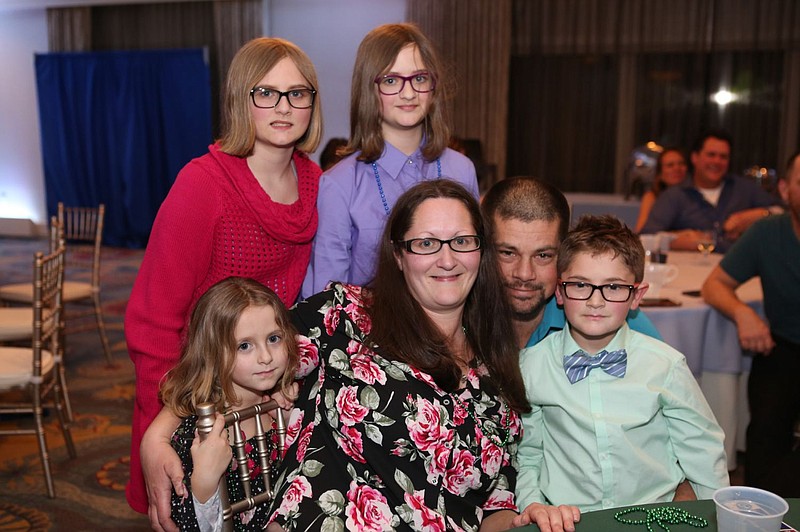 Josh and Missy Bafia, with their four children. 