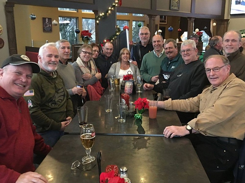 Patrick Coyle, bottom right, at a mini-school reunion in Dec. 2018. 