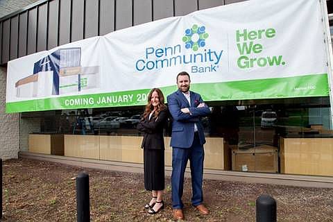 Branch Manager Melanie Scholl and Sales and Service Manager Christopher Stein pose in front of the new Penn Community Bank location coming to Towamenc