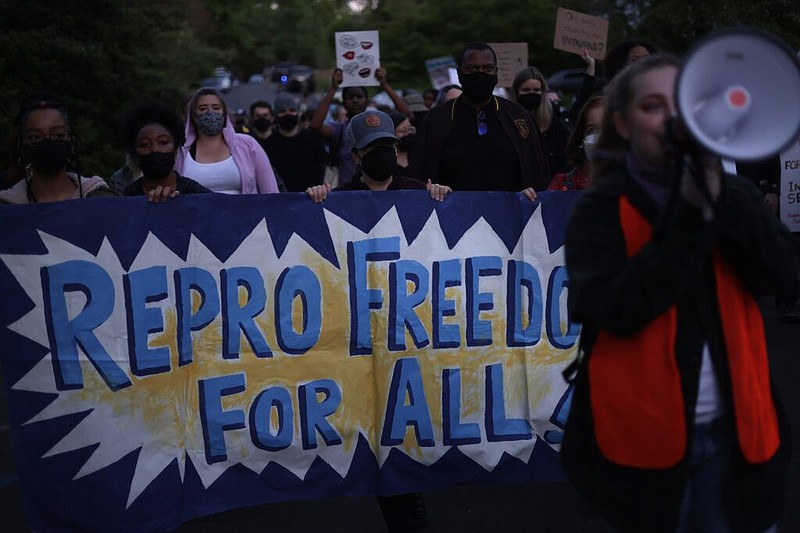 Abortion-rights advocates stage a protest outside U.S. Associate Justice Samuel Alito’s house after an initial draft majority opinion he wrote would o