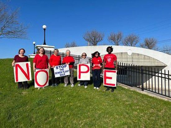 Members of Towamencin ‘NOPE’ demonstrate on Friday, April 15, in opposition to the potential sewer sale, stating ‘We don’t want another mistake made w