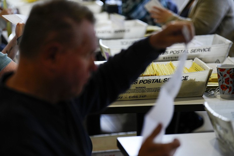 Workers sort mail ballots at Northampton County Courthouse in Easton, Pennsylvania on Nov. 7, 2023. 