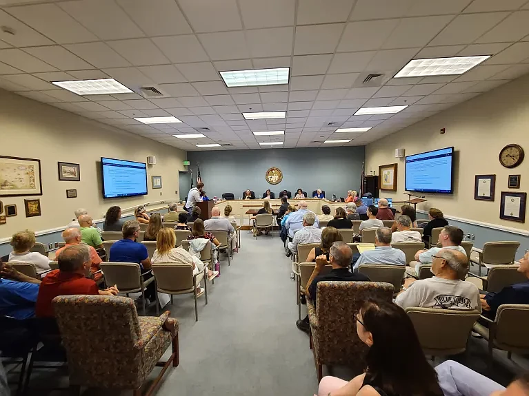 Lansdale councilman BJ Breish, at podium, speaks to Upper Gwynedd’s commissioners after presenting a petition supporting a proposed development on Pen