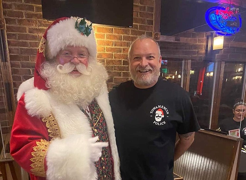 Dutch Schrap, founder of Operation Nine Reindeer, left, with Towamencin Police Chief Tim Troxel, right. 