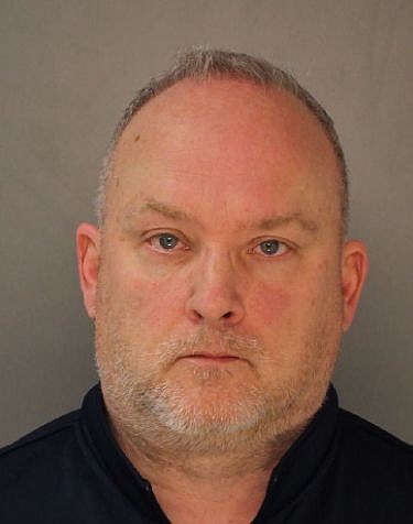 John McGrath, 56, of East Norriton, has been charged with multiple felonies in connection with the alleged theft of more than $25,000 from Our Lady of