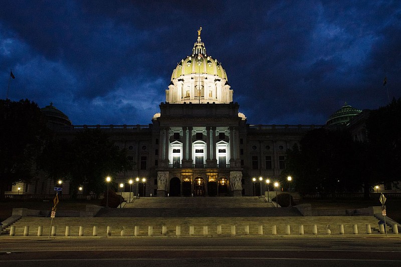 View of the south side of the Pennsylvania State Capitol Complex at night. 