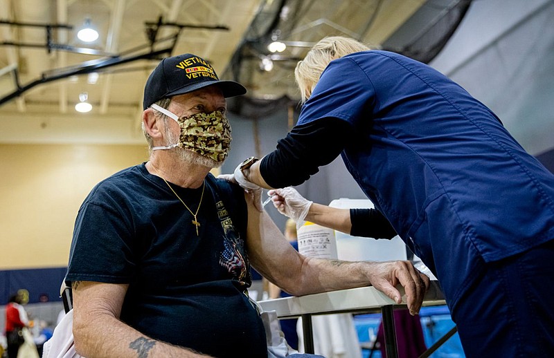 Sen. Maria Collett, who worked to create the Nursing Loan Forgiveness Program, volunteers at a COVID-19 vaccination clinic at North Penn High School i