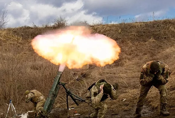 Members of a Ukrainian Army mortar brigade fire earlier this month. 