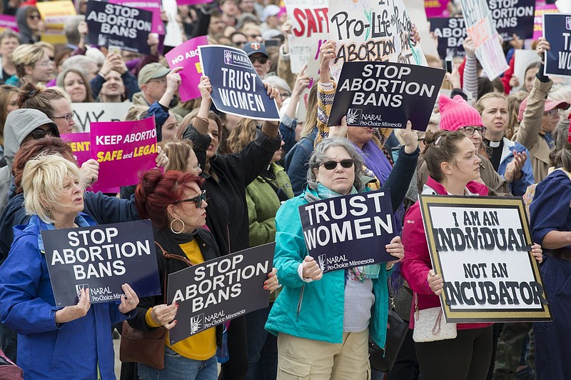 Around 3,000 people met outside the Minnesota state capitol building to protest against new laws banning abortion. 