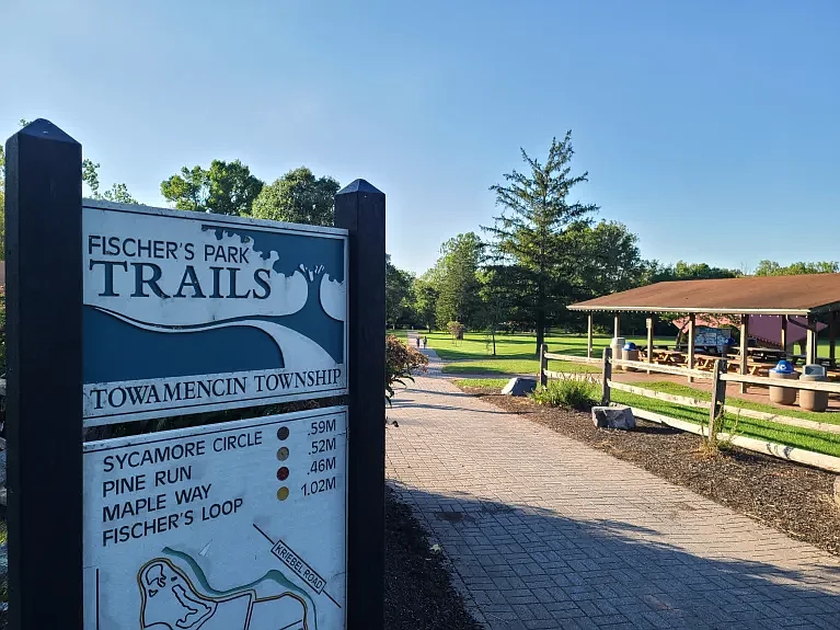 A sign and trail map can be seen at the entrance to Fischer’s Park in Towamencin in fall 2022. 