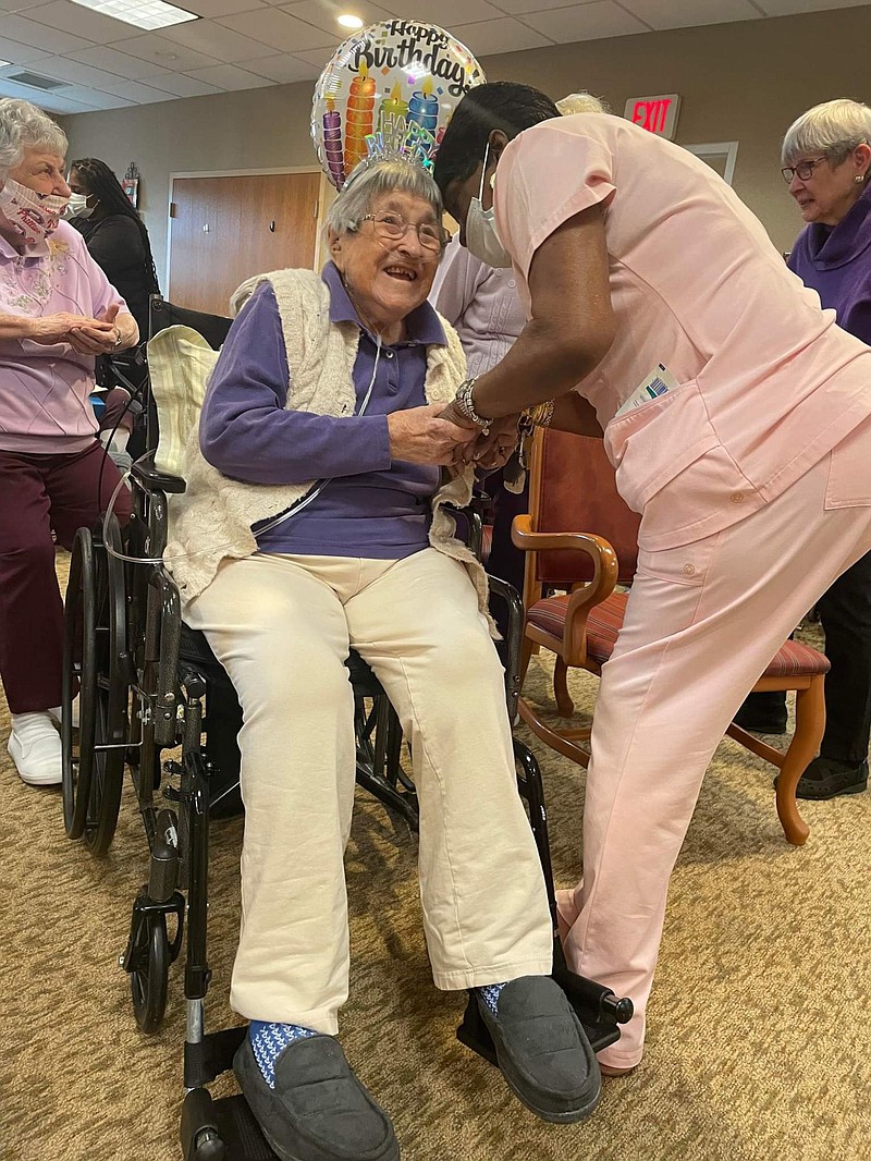 Margaret ‘Peg’ Leichthammer, 106, of Lansdale, as she sits with friends on her birthday. 