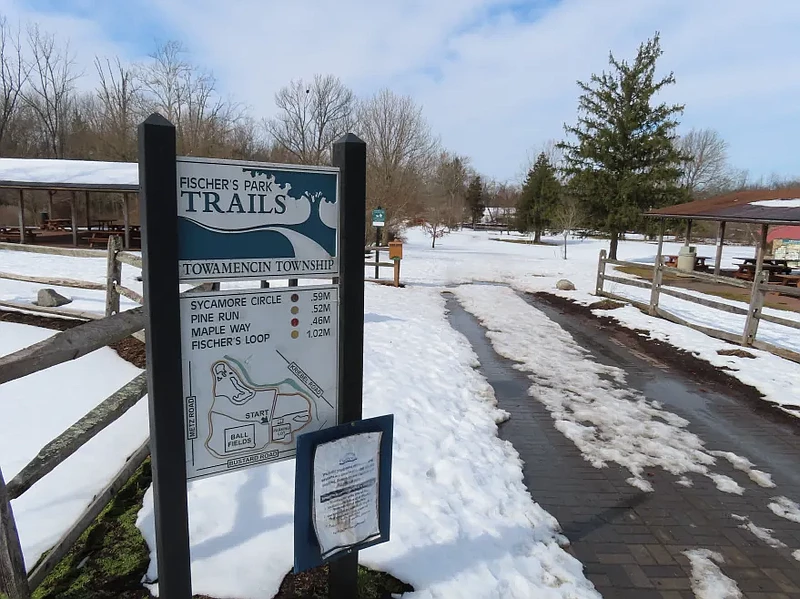 A sign at the entrance to Fischer’s Park in Towamencin indicates the routes of trails running through the park, as seen on Friday, Feb. 26, 2021. 