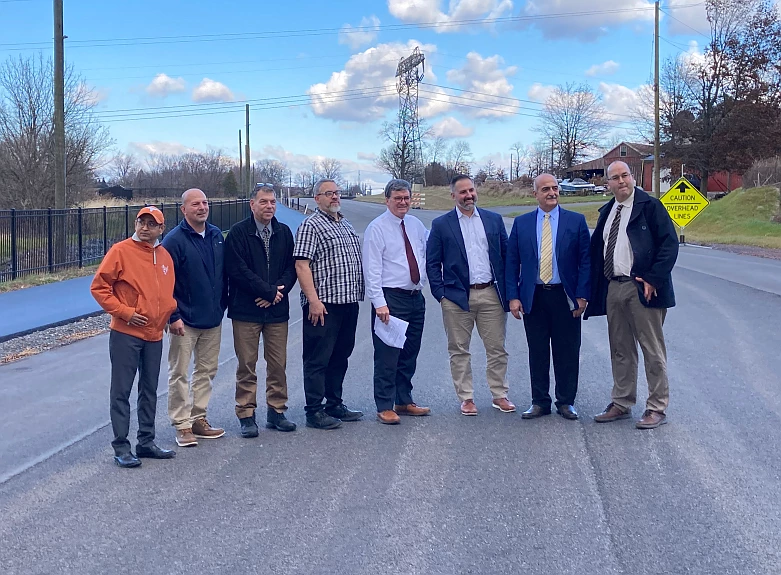 State Rep. Steve Malagari, PennDOT Secretary Mike Caroll and the Route 309 Connector project team tour the 309 Connector worksite Monday afternoon. 