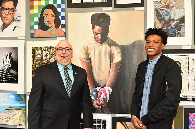 From left to right: Alan Malachowski, president of Pennsylvania State Education Association, Mideastern Region (PSEA/MER), stands with Nathan Addley, 