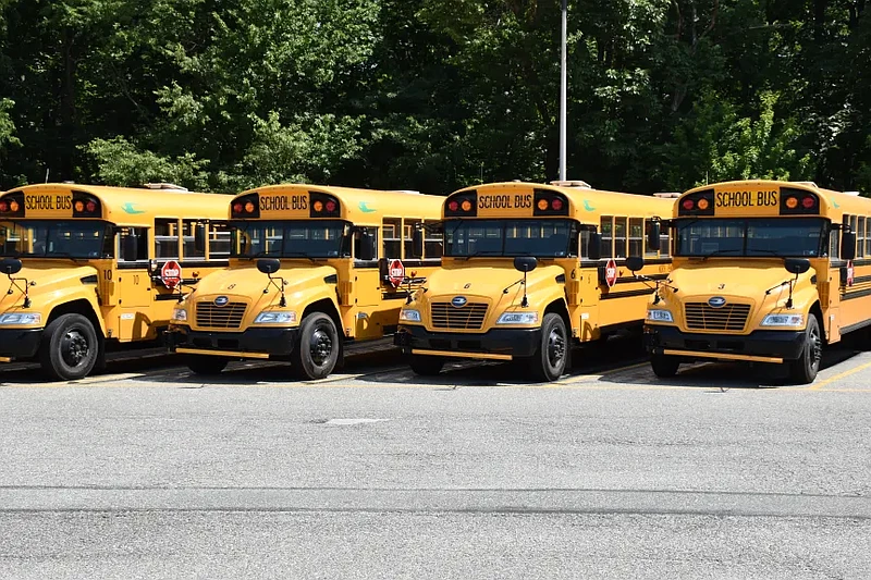 Propane-fueled school buses are seen parked the North Penn School District transportation center in summer 2023. 