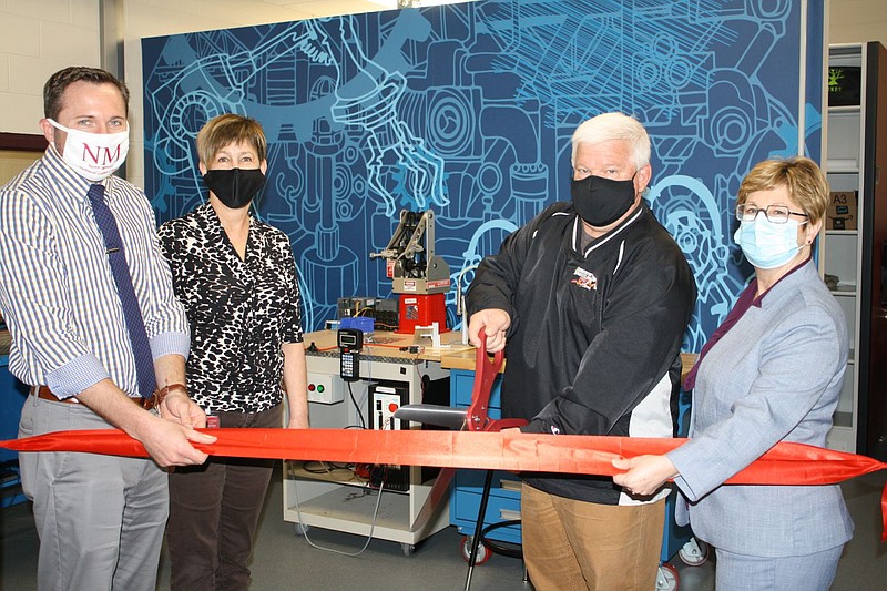 Pictured left to right: Stephen Monastra, NMTCC Principal, Dr. Beth Ann Haas, NMTCC Assistant Director, Mr. William Brong, NMTCC Joint Operating Commi