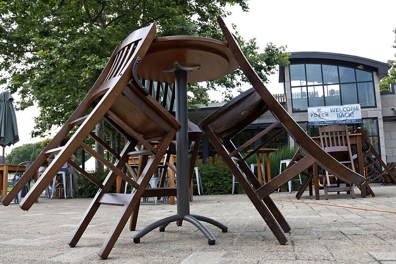 Tables and chairs outside the Porch restaurant in the Oakland neighborhood of Pittsburgh on Thursday, July 9, 2020. 