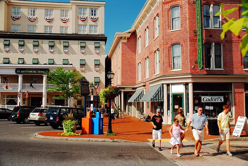 A family walks through downtown Gettysburg, Pennsylvania. 