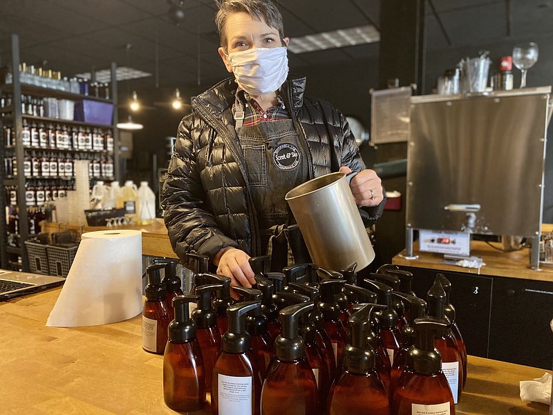 Scent and Sip owner Jennifer Burnley continues to work despite her business being deemed nonessential by Governor Wolf’s business shutdown order. 